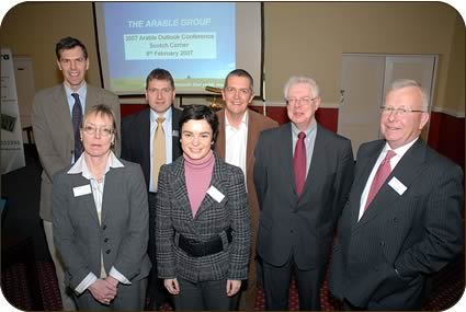 Back left to right, Andrew Wells, Colin MacEwan, Guy Smith, Ian Crute, front left Clare Wenner and Carmen Suarez with conference chairman Julian Cook, right.
