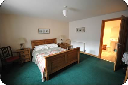  A spacious bedroom and ensuite in one of the holiday cottages