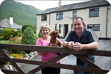 Karen and Andrew Nicholson with Dachshund Frankie